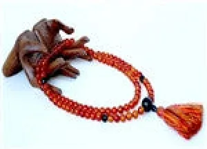 Carnelian Mala with Black Onyx Guru Bead and Faceted Black Onyx Markers