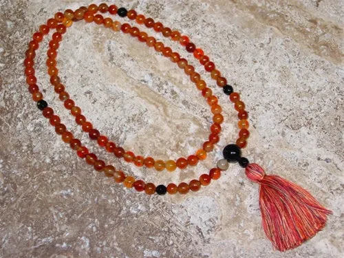 Carnelian Mala with Black Onyx Guru Bead and Faceted Black Onyx Markers