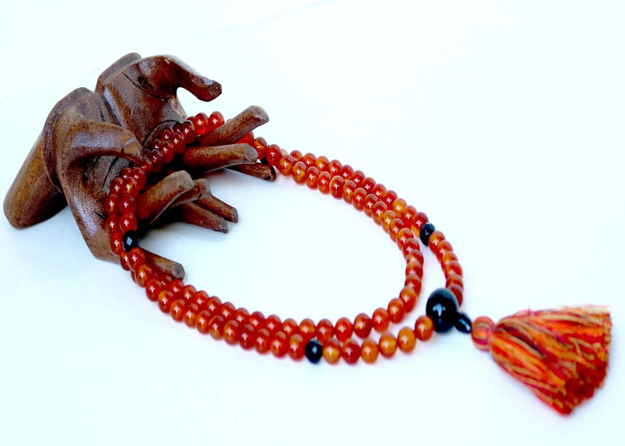 Carnelian Mala with Black Onyx Guru Bead and Faceted Black Onyx Markers
