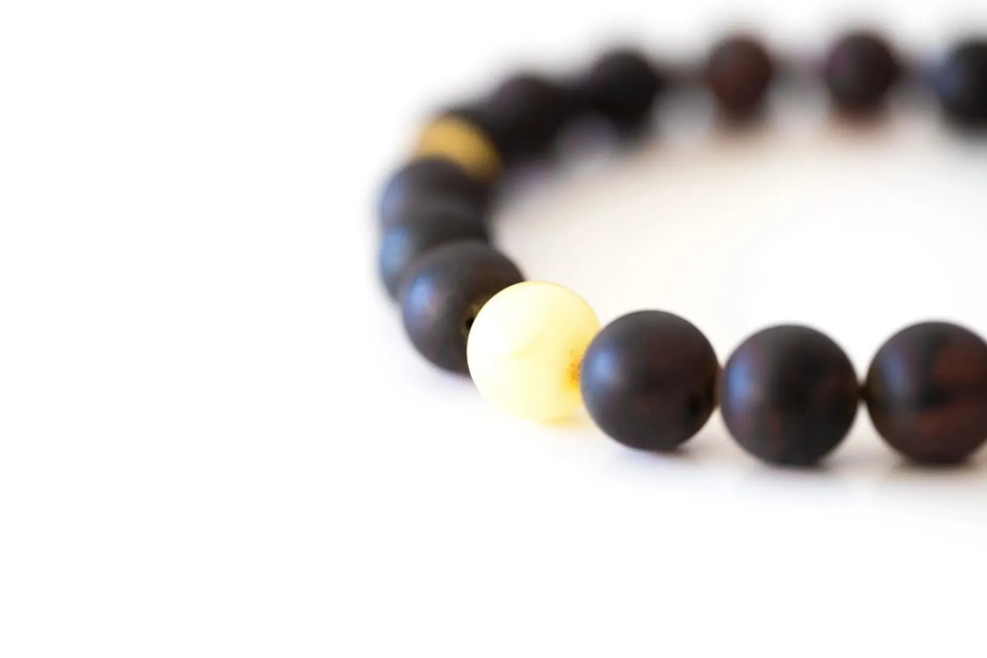 Exquisite Dark Amber Bead Bracelet with Polished Yellow Accents - Handcrafted Baltic Beauty